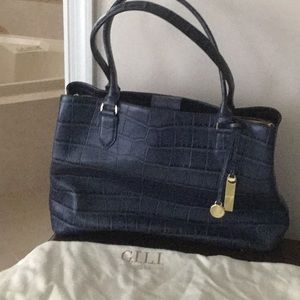 Leather embossed handbag